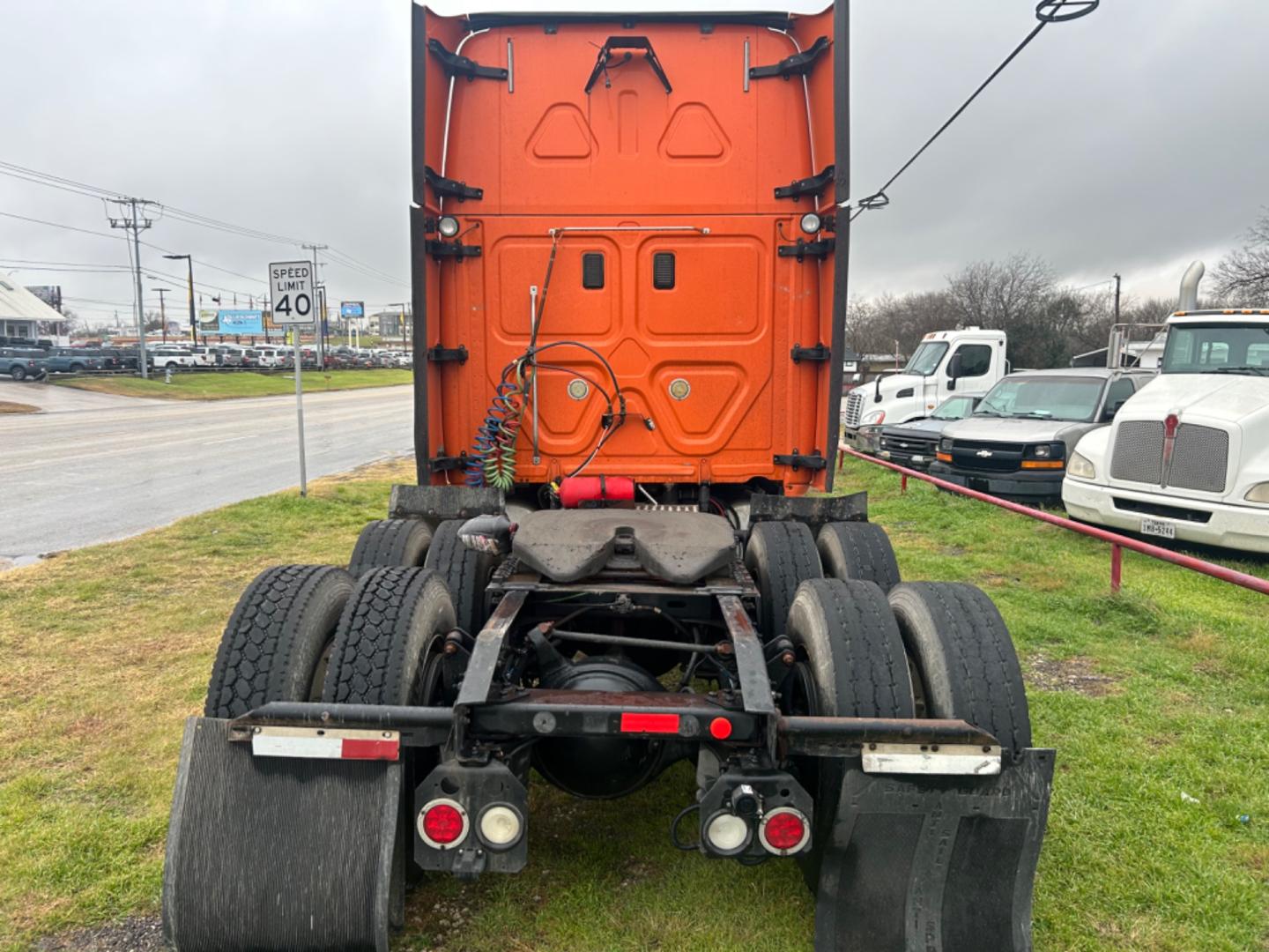 2013 Orange Freightliner Cascadia 125 (3AKJGLDR0DS) , located at 1687 Business 35 S, New Braunfels, TX, 78130, (830) 625-7159, 29.655487, -98.051491 - Photo#3